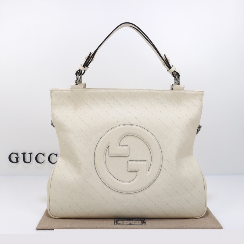 G*u*i top handle bags
